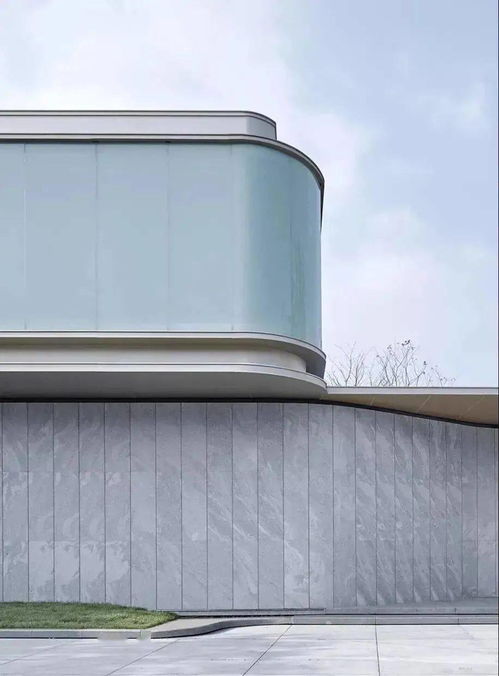 绿色浪潮下的坚实选择 论石材在现代建筑中的核心优势